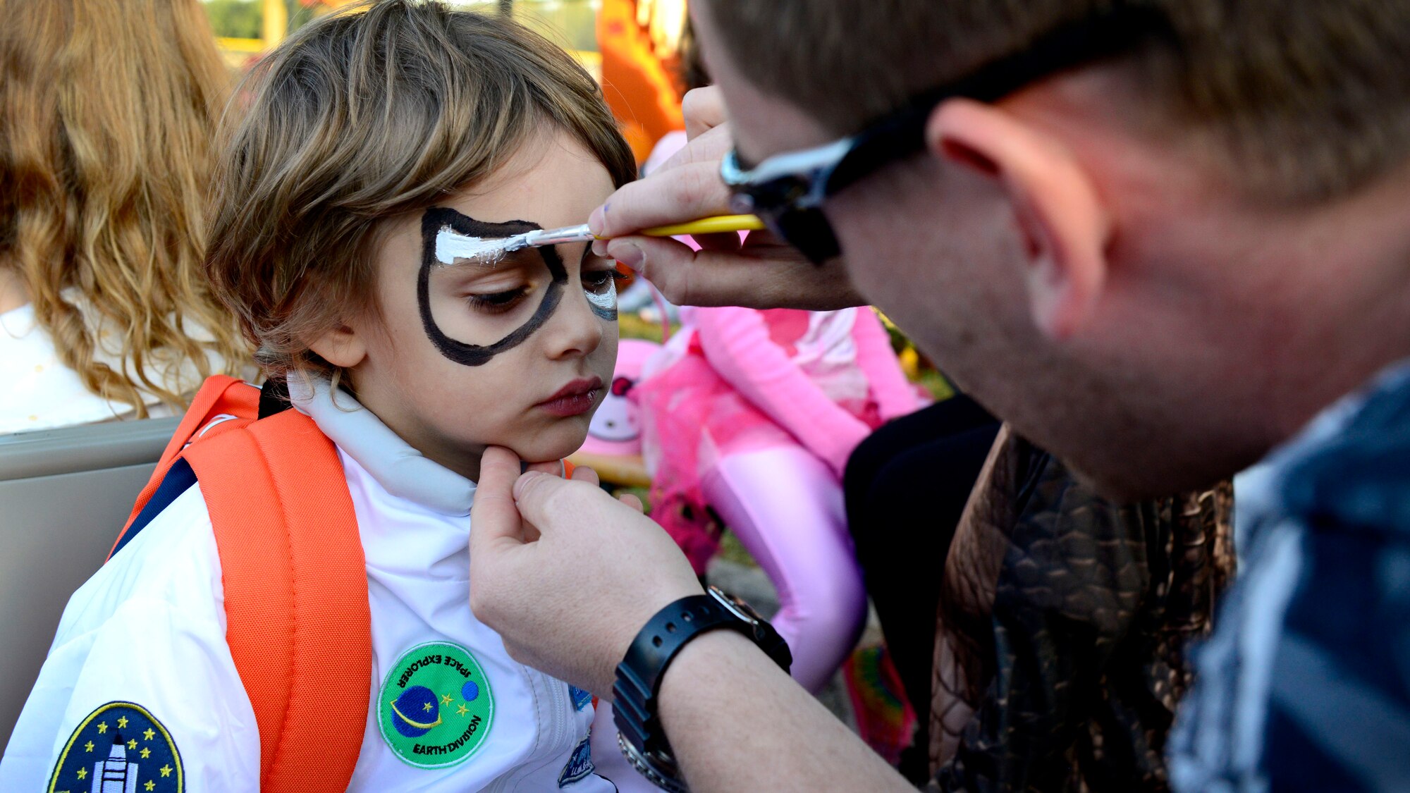 David Destro gets his face painted during “Fall Fest,” Oct. 24, 2015, at Aviano Air Base, Italy. Team Aviano members and the local community came together to celebrate Halloween with children’s games, trick-or-treating, an outdoor movie and a haunted house. (U.S. Air Force photo by Senior Airman Areca T. Bell/Released)