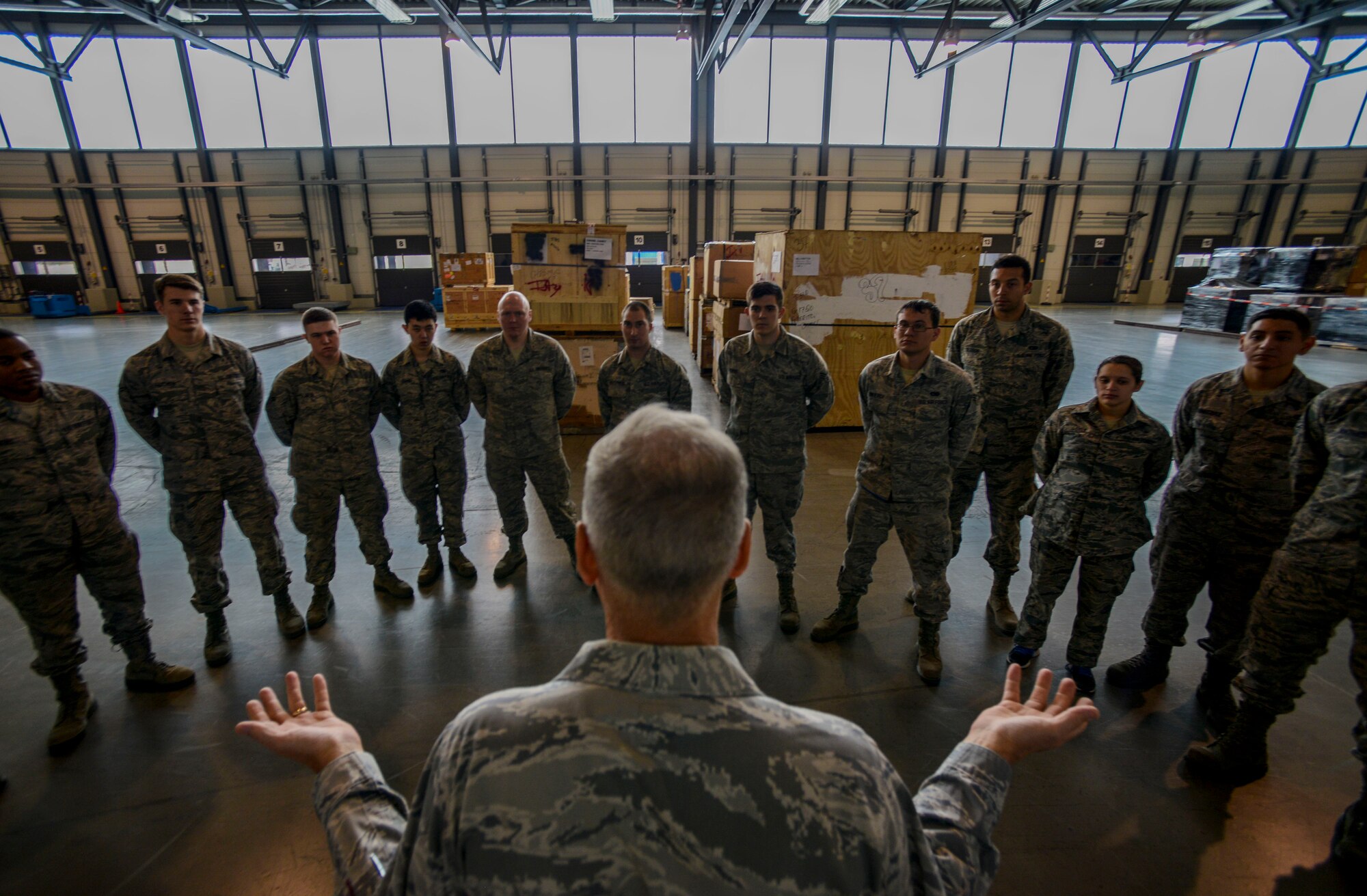 Maj. Gen. Frederick H. Rick Martin, U.S. Air Force Expeditionary Center commander, speaks to Airmen from the 721st Aerial Port Squadron Oct. 13, 2015, at Ramstein Air Base, Germany. During his visit to Ramstein, Martin met with Airmen from the 521st Air Mobility Operations Wing. (U.S. Air Force photo/Senior Airman Nicole Sikorski) 