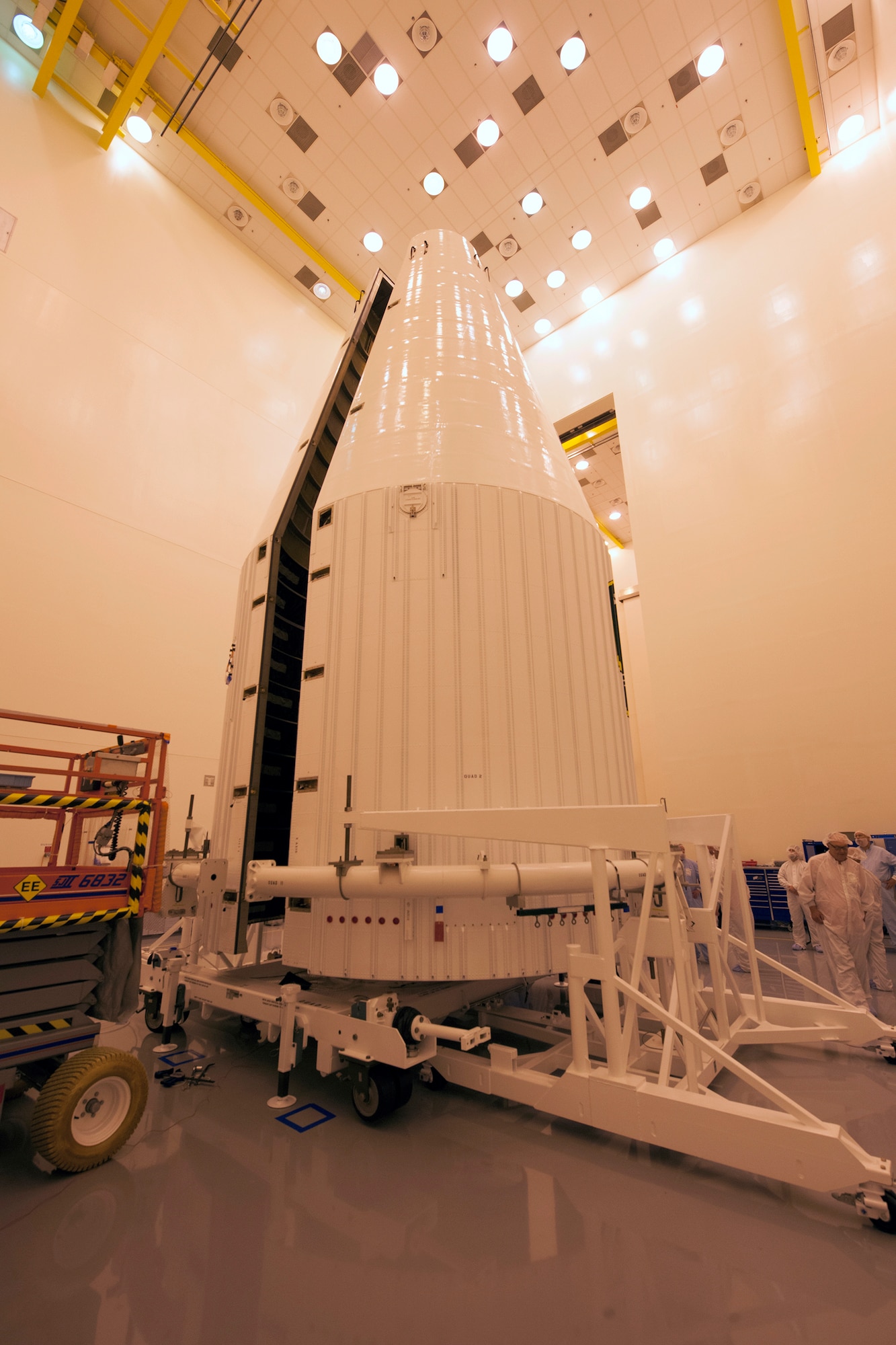 A Global Positioning System IIF-series satellite awaits final encapsulation within a four-meter diameter protective payload fairing Oct. 16 at Cape Canaveral Air Force Station, Fla. GPS IIF satellites provide improved signals that will enhance the precise global positioning, navigation and timing services supporting both the warfighter and the growing civilian needs of our global economy. GPS IIF will provide improved navigational accuracy through advanced atomic clocks, a longer design life than previous GPS satellites, and a third operational civil signal (L5) that benefits commercial aviation and safety-of-life applications. The Air Force and its mission partners are scheduled to launch GPS IIF-11 aboard a United Launch Alliance Atlas V 401 launch vehicle Oct. 30 from Space Launch Complex 41 at Cape Canaveral AFS, Fla. The launch window opens at 12:17 p.m. EDT and will remain open for 18 minutes. (Courtesy photo: United Launch Alliance)  