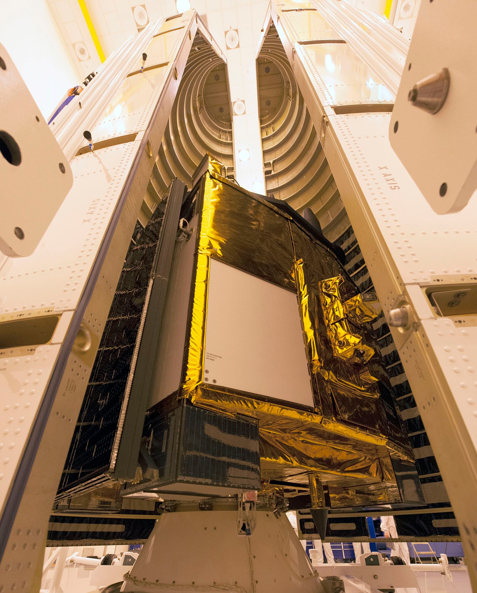 A close-up image of a Global Positioning System IIF-series satellite as it sits atop its payload adapter awaiting final encapsulation within a four-meter diameter protective fairing Oct. 16 at Cape Canaveral Air Force Station, Fla. GPS IIF satellites provide improved signals that will enhance the precise global positioning, navigation and timing services supporting both the warfighter and the growing civilian needs of our global economy. GPS IIF will provide improved navigational accuracy through advanced atomic clocks, a longer design life than previous GPS satellites, and a third operational civil signal (L5) that benefits commercial aviation and safety-of-life applications. The Air Force and its mission partners are scheduled to launch GPS IIF-11 aboard a United Launch Alliance Atlas V 401 launch vehicle Oct. 30 from Space Launch Complex 41 at Cape Canaveral AFS, Fla. The launch window opens at 12:17 p.m. EDT and will remain open for 18 minutes. (Courtesy photo: United Launch Alliance)  