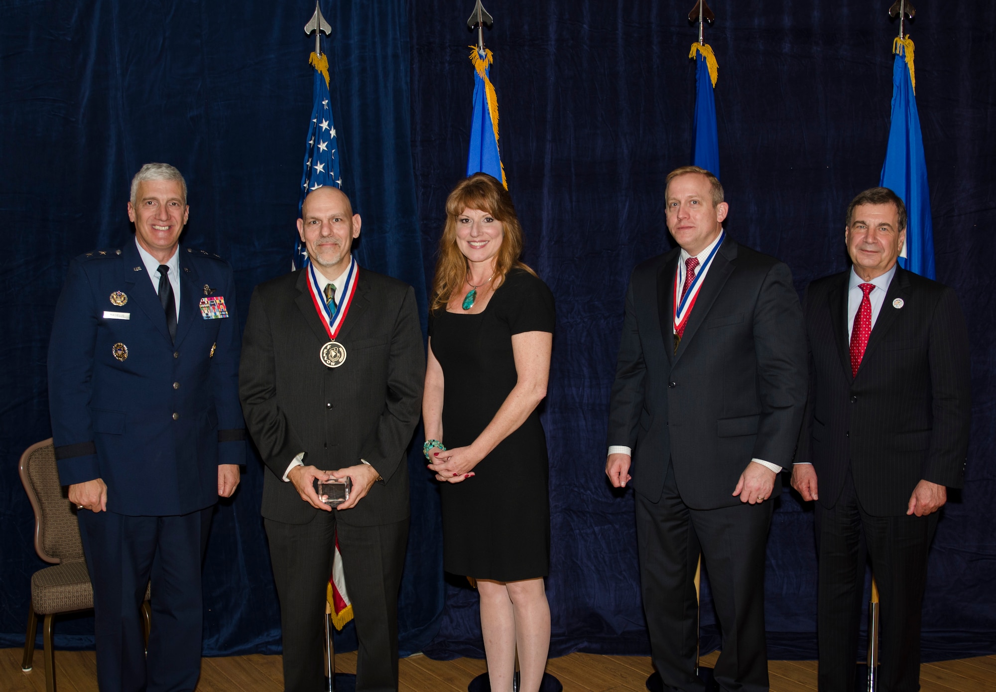 Dr. Raymond Kolonay, the Multidisciplinary Science and Technology Center for the Aerospace Systems Directorate, was inducted into the AFRL Fellows Program on October 22, at the 2015 Fellows Ceremony, which took place at the Wright-Patterson Club. Pictured from left to right are AFRL Commander Maj. Gen. Thomas Masiello, Dr. Raymond Kolonay, Mrs. Kolonay, AFRL Chief Technologist Dr. Morley Stone and Air Force Chief Scientist Dr. Greg Zacharias. (U.S. Air Force photo/Michael Huber)