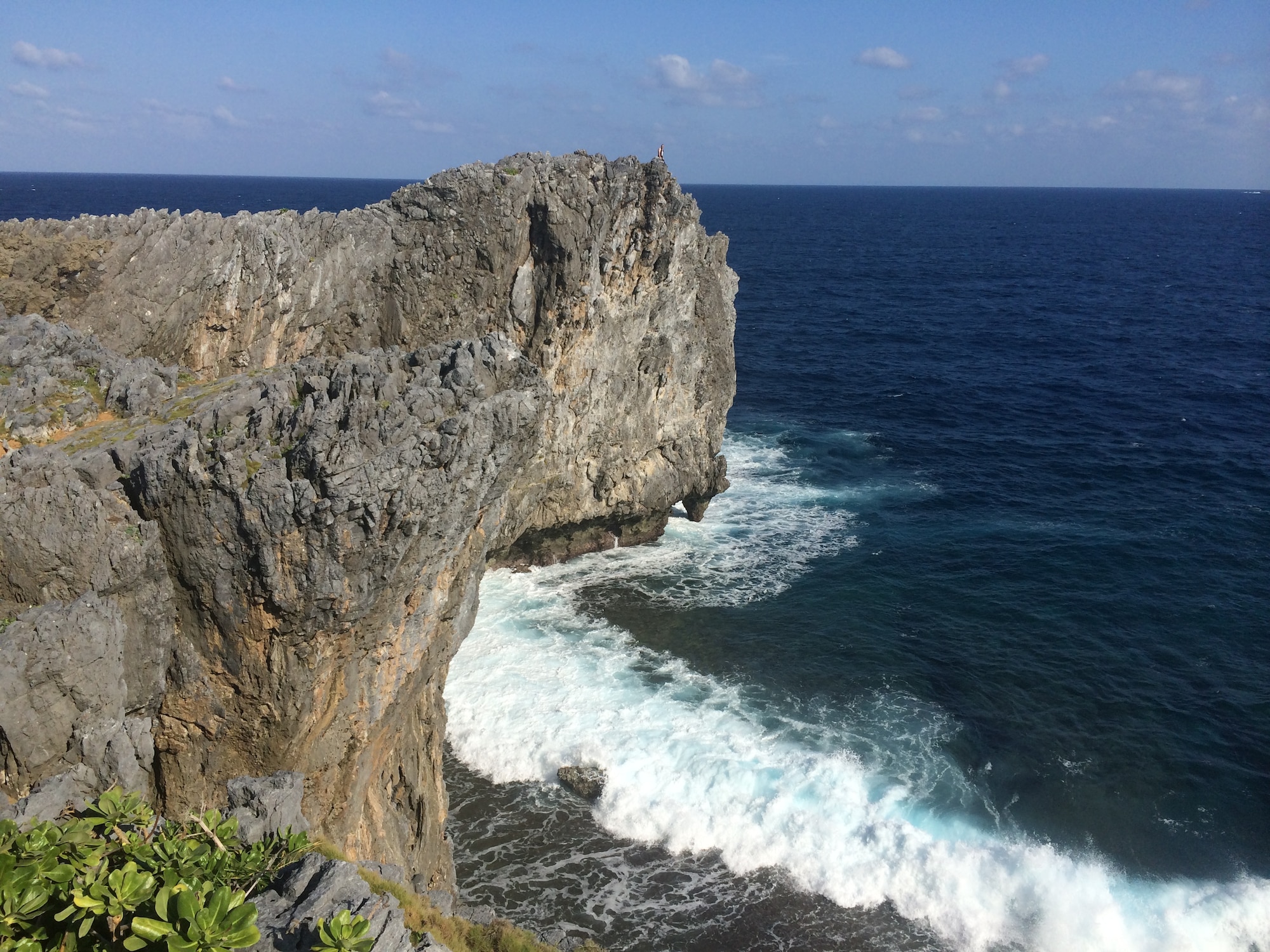 Waves crash against the 200-foot cliffs at Hedo Point, the northern-most spot on Okinawa, on Oct. 18, 2015. The point is a popular tourist destination, and makes for a good day trip from Kadena Air Base. (U.S. Air Force photo by Tim Flack)