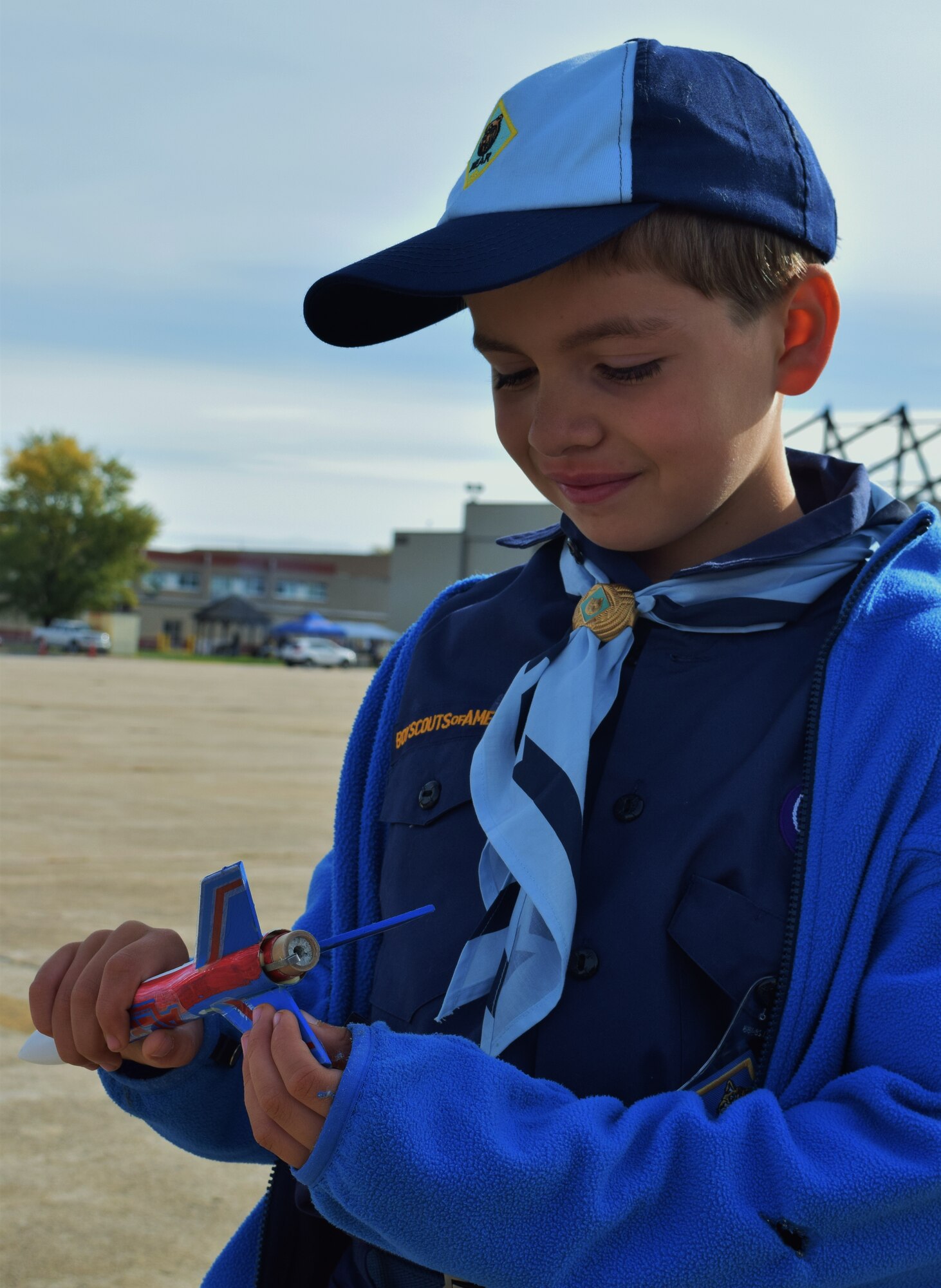 Nicholas Braccia, a Bear Scout with Troop 39 of the Cradle of Liberty, Boy Souts of America, inspects the rocket he prepared prior to launching it during the “Rocket Into Scouting” recruiting event held by the BSA, Oct. 24, 2015 at Horsham Air Guard Station, Pennsylvania. The 111th Attack Wing hosted approximately 700 Scouts and their family members during the event. (U.S. Air National Guard photo by Tech. Sgt. Andria Allmond/Released)