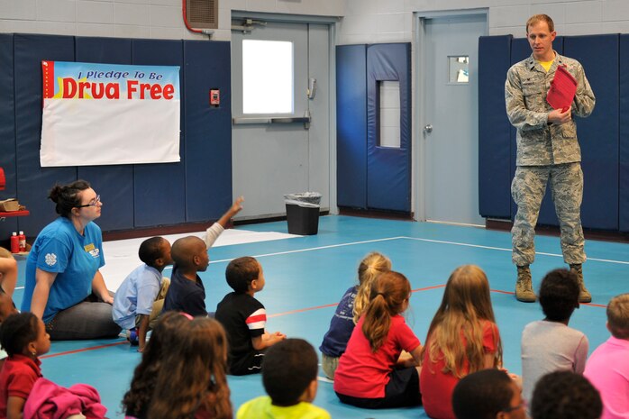 Lt. Col. Ralph Thomas, 628th Mission Support Group deputy commander, reads a proclamation encouraging drug free living at the youth center, Joint Base Charleston, S.C., Oct. 23, 2015. Over 20 children took an oath to be drug free at this annual Red Ribbon Week kick-off ceremony. (U.S. Air Force photo/Tech. Sgt. Renae Pittman)