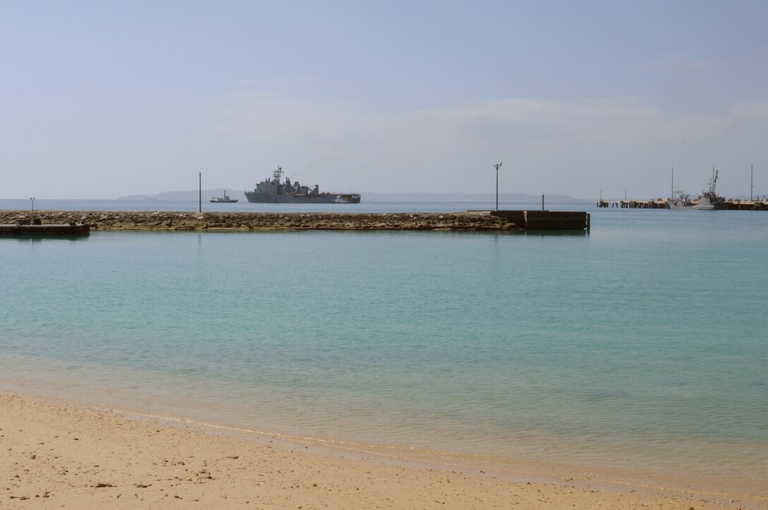 Amphibious dock landing ship USS Germantown (LSD 42) departs Naval Facility White Beach after embarking Marines from 3rd Marine Division, 1st Marine Aircraft Wing and 3rd Marine Logistics Group in preparation for exercise Blue Chromite. Blue Chromite is an amphibious training exercise conducted with the 4th Marine Regiment, Marine Air Group 36, Combat Logistics Regiment 4, and other elements of III Marine Expeditionary Force. Germantown is on patrol in the U.S. 7th Fleet area of operation in support of security and stability in the Indo-Asia-Pacific region. (U.S. Navy Photo by Lt. David A. Levy/Released)