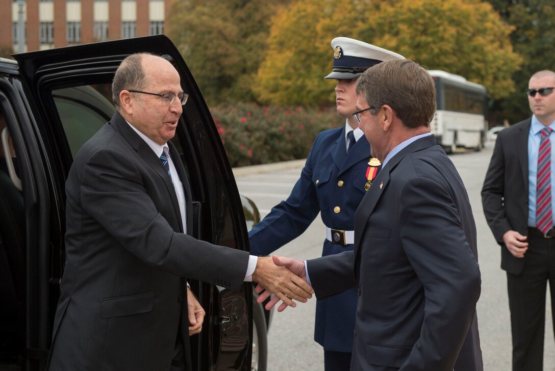 U.S. Defense Secretary Ash Carter greets Israeli Defense Minister Moshe Yaalon as he arrives at National Defense University, Washington, D.C., Oct. 27, 2015. Both leaders spoke to a class of U.S. and international students and met to discuss matters of mutual importance. DoD photo by Air Force Senior Master Sgt. Adrian Cadiz