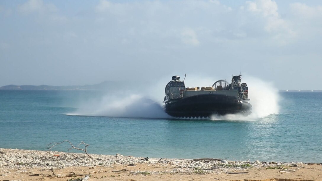 A landing craft air cushion-class hovercraft approaches Kin Blue, Okinawa, Japan, for a beach landing exercise, Oct. 27, 2015, during Blue Chromite 2016. Blue Chromite is a large-scale, cost effective on-island training event lead by 4th Marine Regiment, 3rd Marine division, III Marine Expeditionary Force.