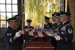 Members of the Colorado National Guard Honor Guard prepare to fold the U.S. flag for Air Force Maj. Gen. John L. France (Ret.) memorial service at Fort Logan National Cemetery, Denver, Colorado, on Oct. 26, 2015. Maj. Gen. France was the longest-serving adjutant general for the state of Colorado.