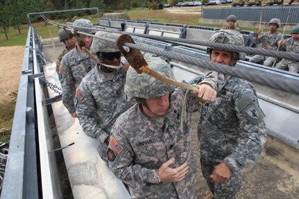 U.S. Army Paratroopers with U.S. Army Civil Affairs and Psychological Operations Command (USACAPOC), rehearse actions on the aircraft during pre-jump training at Fort Bragg, N.C., Oct. 26, 2015. USACAPOC conducts airborne operations in order to maintain proficiency and familiarization with the C-27 aircraft. Photo by Sgt. 1st Class Sean A. Foley (Released)