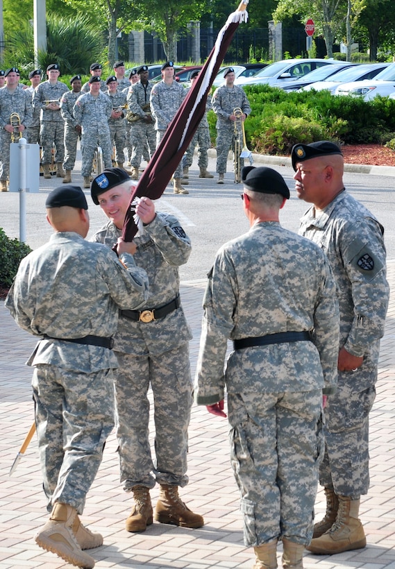 Maj. Gen. Mary E. Link, incoming commanding general of the Army Reserve Medical Command receives the guidon from Maj. Gen. Luis R. Visot, the U.S. Army Reserve Command chief of staff, during the ARMEDCOM change of command ceremony held Sept. 26, 2015 at the C.W. Bill Young Armed Forces Reserve Center in Pinellas Park, Fla. The transfer of the flag from Visot to Link signifies entrusting her with the authority and responsibility of command. Link served as the deputy commanding general for ARMEDCOM for three years prior to her promotion and subsequent assignment as the commanding general of ARMEDCOM.