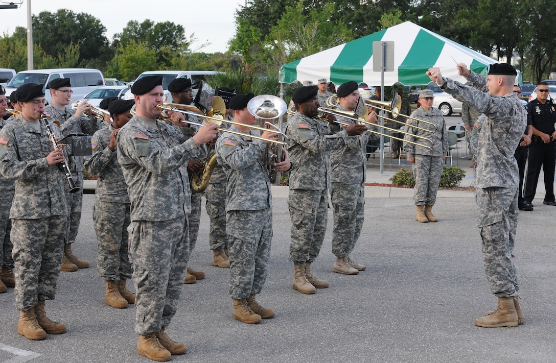 The 313th Army Reserve Band out of Birmingham, Ala., plays the Army Song during the Army Reserve Medical Command Change of Command Ceremony held Sept. 26, 2015, at the C.W. Bill Young Armed Forces Reserve Center in Pinellas Park, Fla. During the ceremony, the incoming command team Maj. Gen. Mary E. Link and Command Sgt. Maj. Marlo V. Cross, assumed command and responsibility respectively from Maj. Gen. Bryan R. Kelly and Command Sgt. Maj. Harold P. Estabrooks, the outgoing command team.