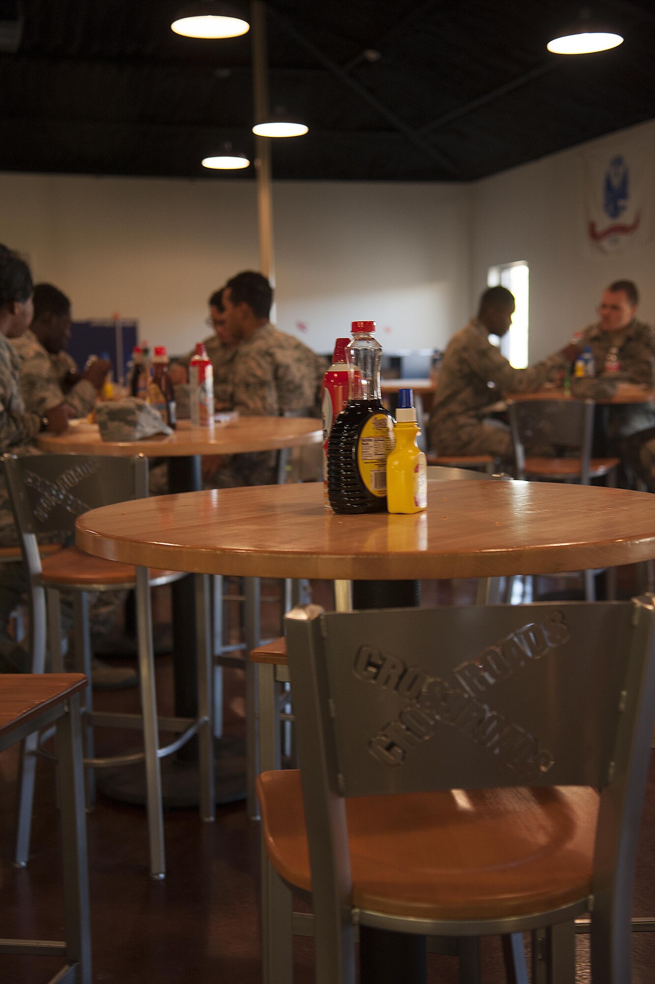 Condiments sit on a table at the Waffle ra-IDS in the Crossroads Student Center on Goodfellow Air Force Base, Texas, Oct. 27, 2015. Anyone with access to the base could come to the Crossroads Student Center to receive free waffles and chicken. (U.S. Air Force photo by Airman Caelynn Ferguson/Released)