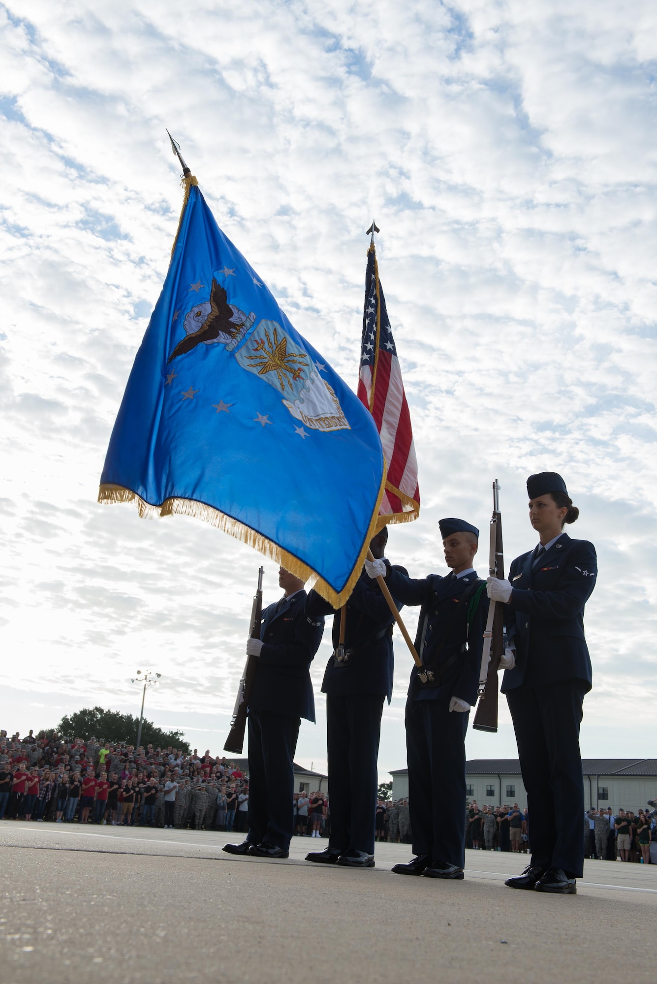 Airmen post the colors as the national anthem is played during the 81st Training Group drill down at the Levitow Training Support Facility Drill Pad, Oct. 23, 2015,  Keesler Air Force Base, Miss. The 334th Training Squadron placed first overall in the event.  (U.S. Air Force photo by Marie Floyd)

