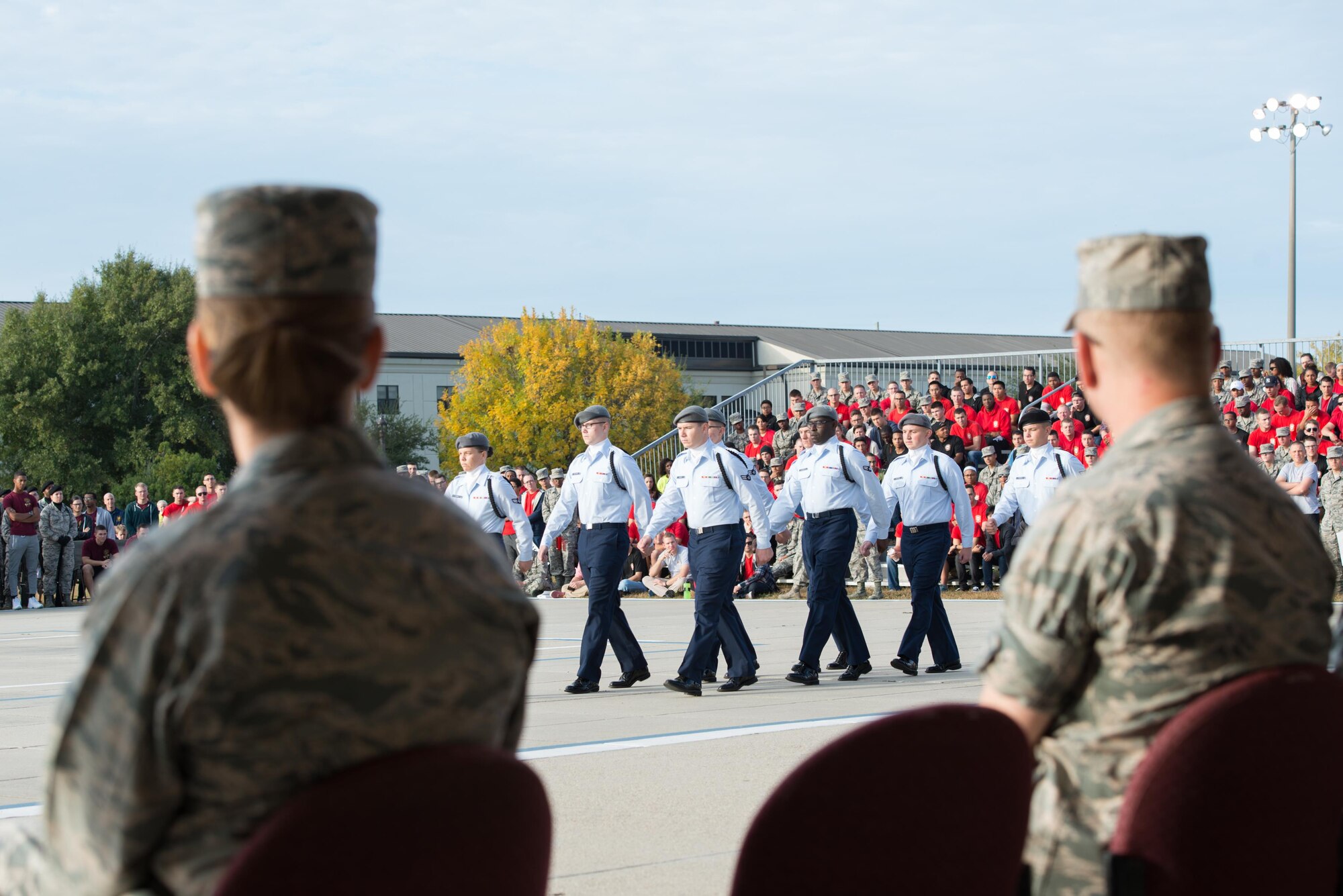 Col. Michele Edmondson, 81st Training Wing commander, and Col. Dennis Scarborough, 81st TRW vice commander, observe as members of the 335th Training Squadron “Bulls” regulation drill team perform during the 81st Training Group drill down at the Levitow Training Support Facility Drill Pad, Oct. 23, 2015, Keesler Air Force Base, Miss. The 334th Training Squadron placed first overall in the event. (U.S. Air Force photo by Marie Floyd)