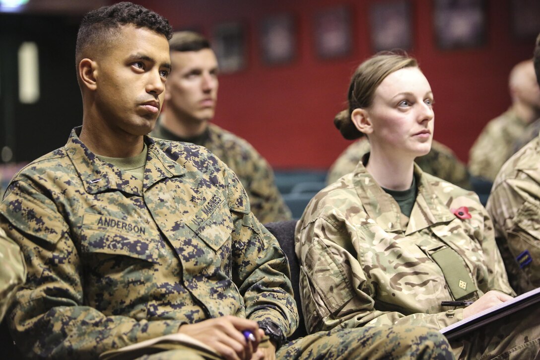 U.S. Marine 1st Lt. Steve E. Anderson, a watch chief with 2nd Intelligence Battalion and British soldiers attend a class before beginning Exercise Phoenix Odyssey II in Edinburgh, U.K., Oct. 25, 2015. For the second consecutive year, both forces will conduct intelligence training and practice military skills in order to increase proficiency and build long lasting partnerships. (U.S. Marine Corps photo by Pfc. Erick Galera/Released)