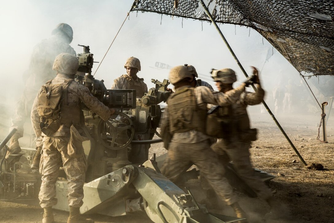 U.S. Marines with Battery “B”, 2nd Battalion, 1st Marine Regiment, load a M777A2 Howitzer during Composite Training Unit Exercise (COMPTUEX) at San Clemente Island, Calif., Oct. 22, 2015. COMPTUEX provides the PHIBRON-MEU the opportunity to integrate planning while also allowing focused, mission-specific training and evaluation for the Marines and their Navy Counterparts. (U.S. Marine Corps photo by Sgt. Hector de Jesus/Released)