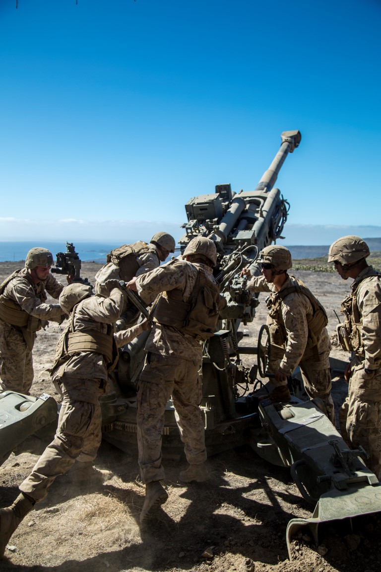 U.S. Marines with Battery “B”, 2nd Battalion, 1st Marine Regiment, load a M777A2 Howitzer during Composite Training Unit Exercise (COMPTUEX) at San Clemente Island, Calif., on Oct. 22, 2015. COMPTUEX provides the PHIBRON-MEU the opportunity to integrate planning while also allowing focused, mission-specific training and evaluation for the Marines and their Navy Counterparts. (U.S. Marine Corps photo by Sgt. Hector de Jesus/Released)