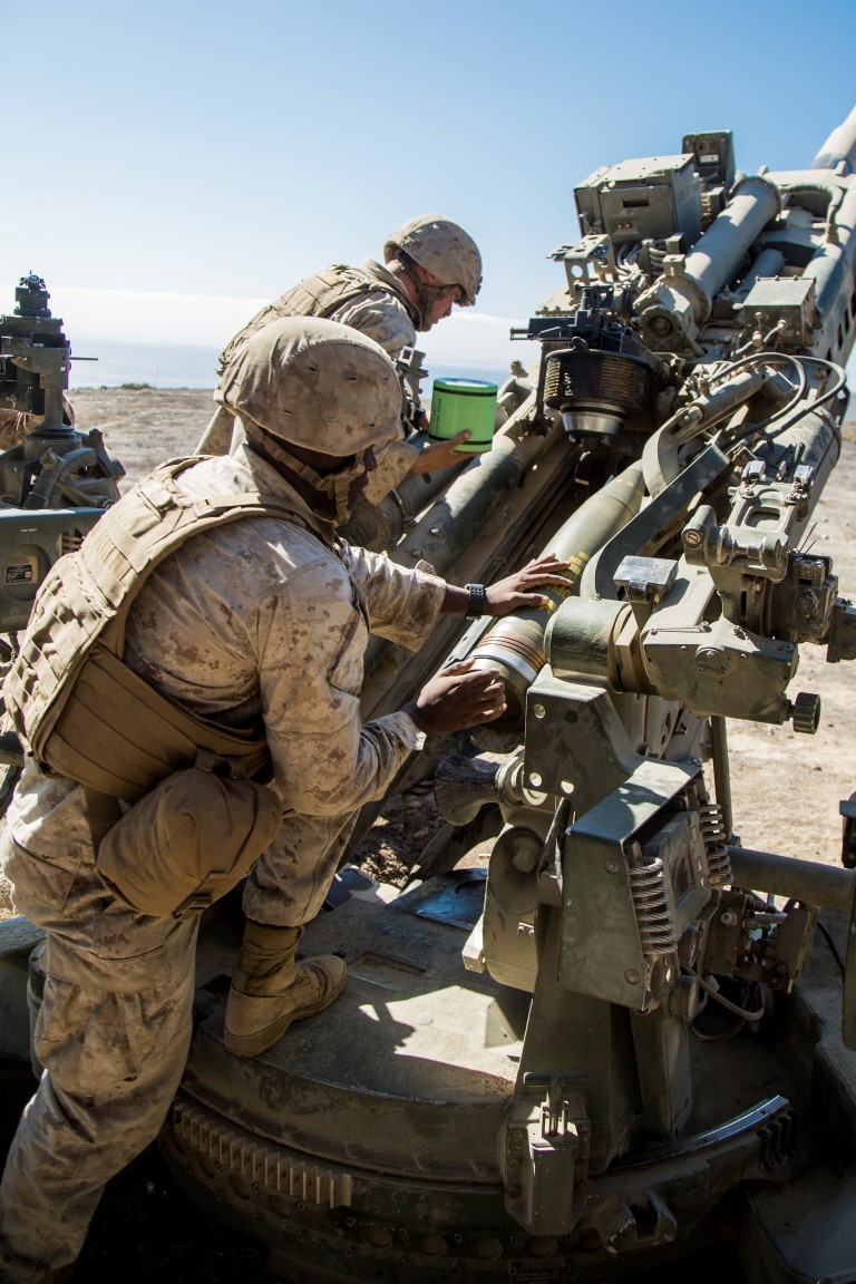 U.S. Marine Corps Corporal Travis Capps with Battery “B”, 2nd Battalion, 1st Marine Regiment, loads a M777A2 Howitzer during Composite Training Unit Exercise (COMPTUEX) at San Clemente Island, Calif., on Oct. 22, 2015. COMPTUEX provides the PHIBRON-MEU the opportunity to integrate planning while also allowing focused, mission-specific training and evaluation for the Marines and their Navy Counterparts. (U.S. Marine Corps photo by Sgt. Hector de Jesus/Released)