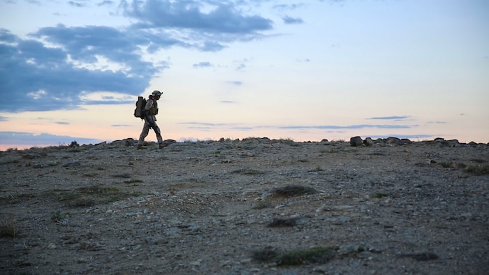 Cpl. Joseph Giordano, a team leader with Alpha Battery, 3rd Low Altitude Air Defense Battalion, carries a FIM-92 stinger weapons system during the National Training Center Rotation 16-01 on Fort Irwin, Calif., Oct. 20. This was the first time in more than 10 years that a Marine LAAD unit participated in this exercise.