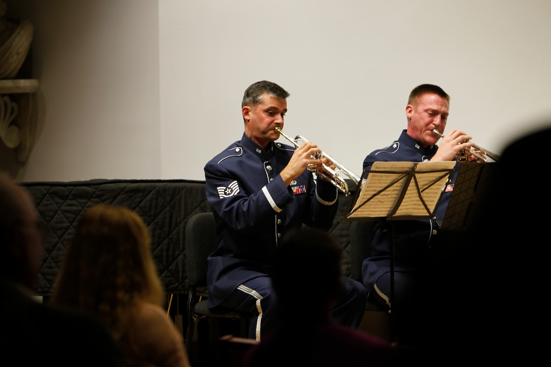 Technical Sgts. Karl Sweedy and Nathan Clark perform in a brass sextet during a chamber concert put on by the Ceremonial Brass. The performance took place October 22 at the Lyceum Museum in Alexandra, VA, and was part of the USAF Band's Chamber Players Series. (U.S. Air Force photo by Technical Sgt. Matthew Shipes/released).