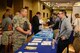 Master Sgt. David Addison, 607th Air Control Squadron heating ventilation and air conditioning flight chief, talks with job fair representatives at Luke Air Force Base, Arizona, Oct. 28, 2015. The job fair was located at Club Five Six and featured representatives from various organizations with work available for all Active Duty, Reserve, Guard members and retirees. (U.S. Air Force photo by Senior Airman James Hensley)   