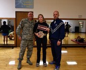 From left to right, Master Sgt. Paul Watts, 341st Munitions Squadron munitions accountable systems supervisor, Dr. Elin Pierce, 341st Civil Engineer Squadron fish and wildlife biologist, and Master Sgt. Robert Taylor, 341st CES first sergeant, pose for a photograph after the Malmstrom Air Force Base physical training competition Oct. 27, 2015. Pierce took first place in the competition. (U.S. Air Force photo/Airman Collin Schmidt)