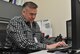 Greg Brown, 341st Medical Group medical contract manager, drafts a memorandum of understanding between the group and a local medical provider Oct. 26, 2015. As a medical logistician, Brown procures the services of providers, nurses, technicians and administrative clerks for the Malmstrom Air Force Base, Mont., community. He also arranges training affiliation agreements with six universities that allow students to intern at the Malmstrom Clinic. (U.S. Air Force photo/ John Turner)