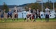 Adam Paini, 436th Security Forces Squadron quarterback, looks over the 436th Logistics Readiness Squadron defensive formation during an intramural flag football game Oct. 26, 2015, on Dover Air Force Base, Del. The offense and defense of the 436th LRS proved too much for the 436th SFS Defenders, losing 35-15. (U.S. Air Force photo/Roland Balik)