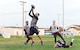 Joshua Hernandez, 436th Logistics Readiness Squadron, intercepts a pass from Adam Paini, 436th Security Forces Squadron quarterback, Oct. 26, 2015, on Dover Air Force Base, Del. The 436th LRS beat 436th SFS, 35-15, in their third meeting of the Dover AFB intramural flag football season. (U.S. Air Force photo/Roland Balik)