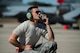 BEJA AIR BASE, Portugal – U.S. Air Force Senior Airman Kyle Sumpter, 52nd Aircraft Maintenance Squadron crew chief from Spangdahlem Air Base, Germany, speaks to an F-16 Fighting Falcon fighter aircraft pilot assigned to the 480th Fighter Squadron while conducting a pre-flight check before a mission at Exercise Trident Juncture 2015 at Beja Air Base, Portugal, Oct. 22, 2015. The crew chief is responsible for the maintenance, upkeep, appearance and overall condition of the aircraft. (U.S. Air Force photo by Airman 1st Class Luke Kitterman/Released)  