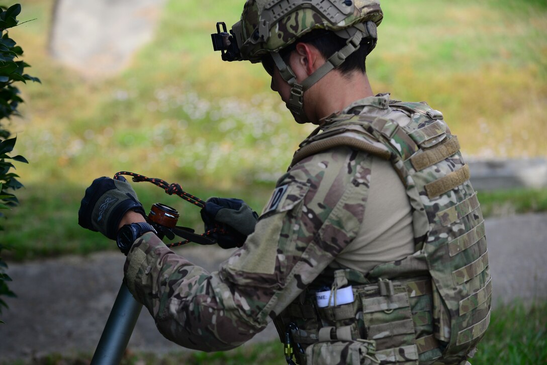 U.S. Air Force Tech. Sgt. Charles Shewmaker, 633rd Civil Engineer Squadron Explosive Ordnance Disposal team lead, approaches a simulated explosive device at Langley Air Force Base, Va., Oct. 14, 2015. U.S. Air Force EOD technicians are trained to detect, identify, render safe, recover and dispose of hazardous explosives and ordnances. (U.S. Air Force photo by Senior Airman Kimberly Nagle/Released)