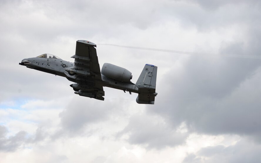 151021-F-WJ837-933-A U.S. Air Force A-10 Thunderbolt II attack aircraft assigned to the 74th Expeditionary Fighter Squadron from the 23d Wing at Moody Air Force Base, Georgia, executes a show-of-force maneuver during a live-fire exercise as part of Brave Warrior 2015 at Bakony Combat Training Centre, Veszprem, Hungary, Oct. 21, 2015. The 74th EFS aircraft provided close air support during Brave Warrior 2015, which is designed to enhance interoperability, increase operational readiness and strengthen allied relationships. (U.S. Air Force photo by Andrea Jenkins/Released)