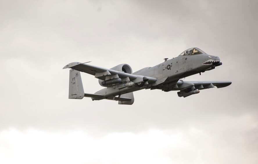 A U.S. Air Force A-10 Thunderbolt II attack aircraft assigned to the 74th Expeditionary Fighter Squadron from the 23d Wing at Moody Air Force Base, Georgia, provides close-air support during a live-fire exercise as part of NATO exercise Brave Warrior 2015 at Bakony Combat Training Centre, Veszprem, Hungary, Oct. 21, 2015. The 74th EFS aircraft participated in Brave Warrior 2015 along with the U.S. Army’s soldiers and Hungarian Defense Forces to enhance interoperability, increase operational readiness and strengthen allied relationships. (U.S. Air Force photo by Andrea Jenkins/Released)