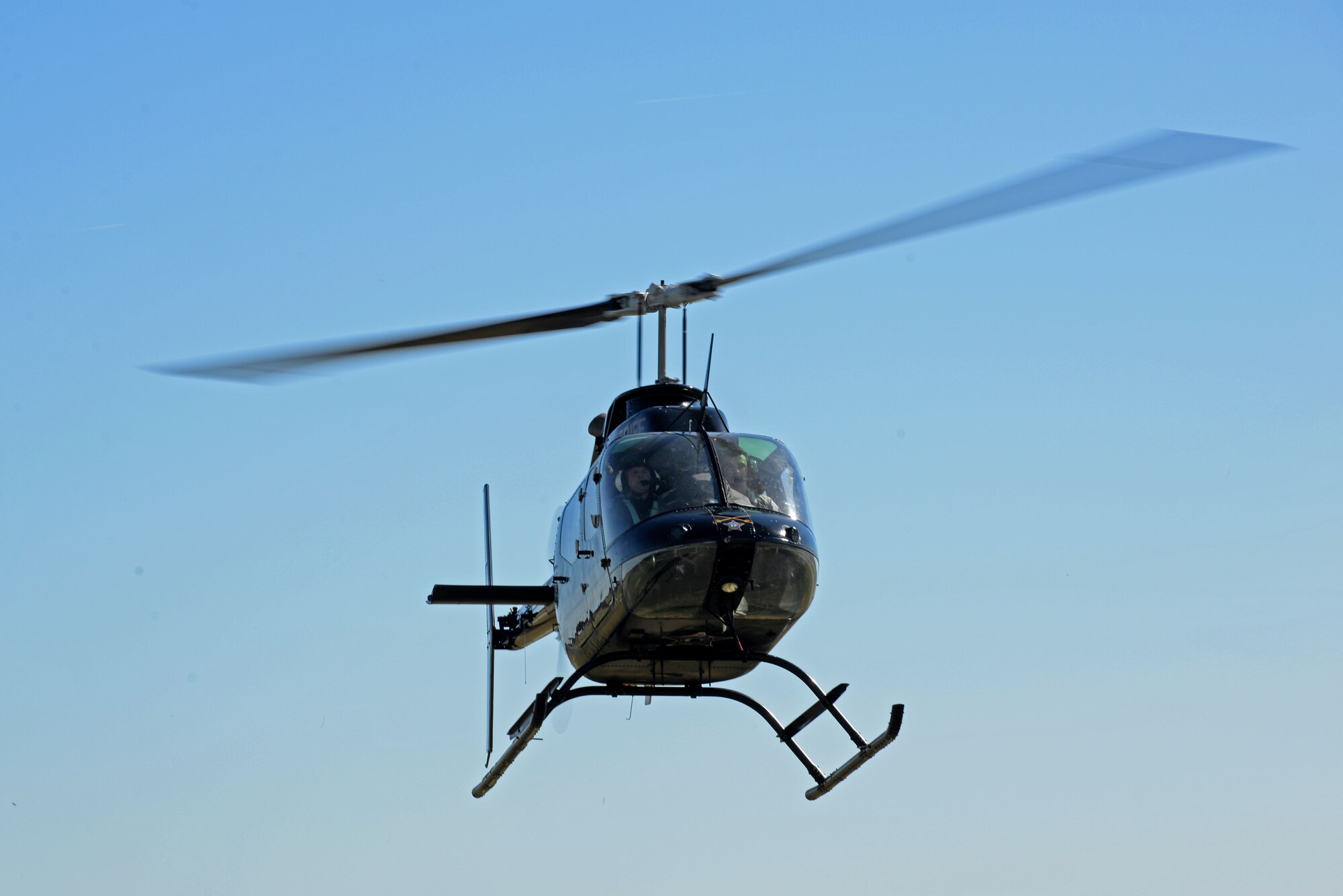 Lt. Tom Parker, Wayne County Sheriff’s Office aviation unit chief pilot, flies Team Seymour Airmen in an incentive flight, Oct. 21, 2015, at the Wayne Executive Jetport, Goldsboro, North Carolina. The WCSO offered incentive rides to familiarize newer 4th Operations Support Squadron Airmen with helicopter pilots’ experience. (U.S. Air Force photo/Airman 1st Class Ashley Williamson)