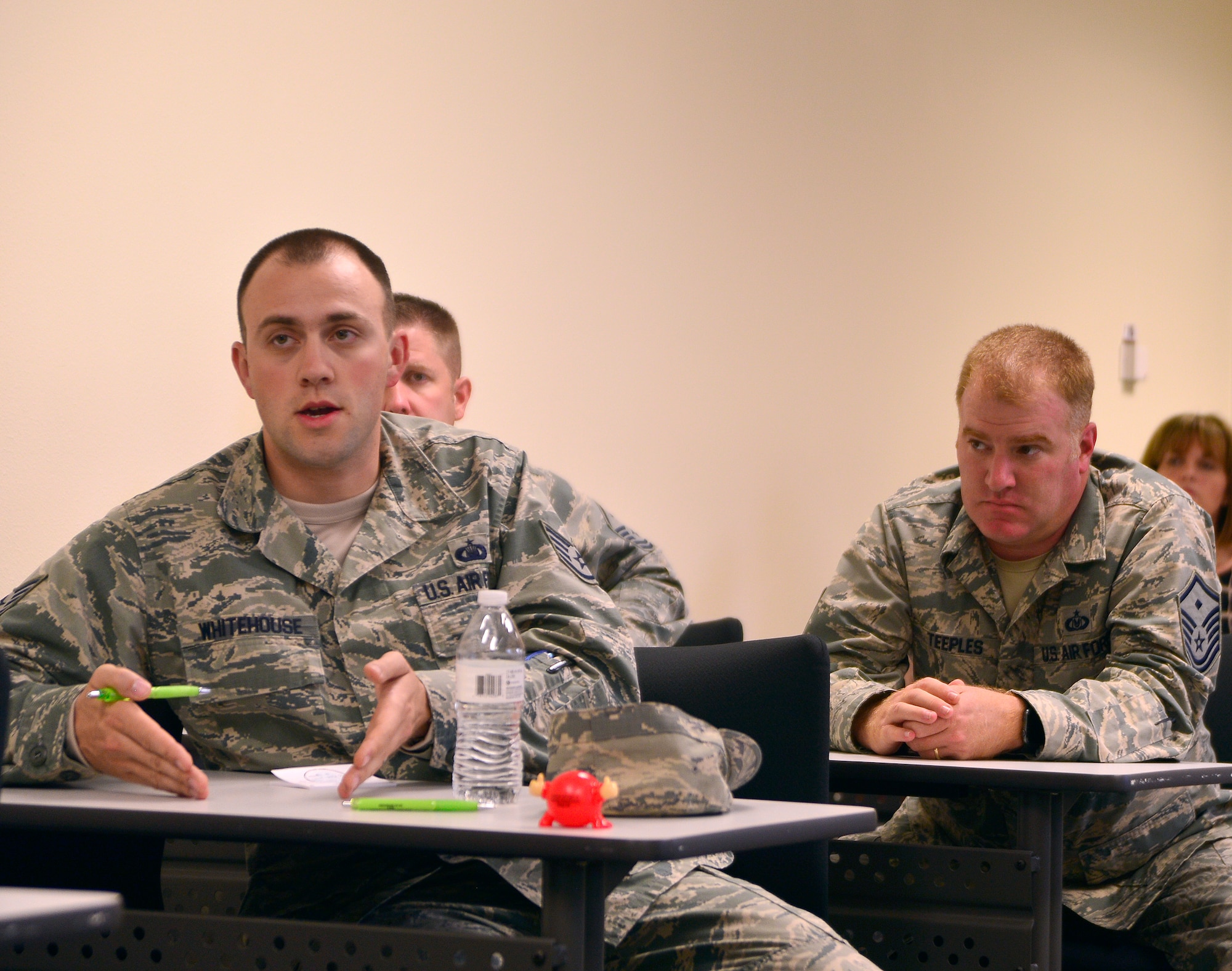 Staff Sgt. Bradley Whitehouse, 432nd Wing/432nd Air Expeditionary Wing chaplain assistant discusses a plan of action to address Airmen concerns during an integrated delivery system meeting Oct. 26, 2015, at Creech Air Force Base, Nevada. The IDS is a cross-functional organization consisting of key helping agencies on base such as public affairs, first sergeants council, chaplain corps, key spouses, human performance team, Airman's council and other organizations coming together to help address Airman's concerns and build resiliency. (U.S. Air Force photo by Airman 1st Class Christian Clausen/Released)