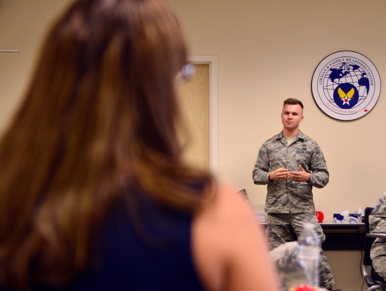 Tech. Sgt. Noah Stamps, 432nd Wing/432nd Air Expeditionary Wing command chief assistant addresses Airmen concerns during an integrated delivery system meeting Oct. 26, 2015, at Creech Air Force Base, Nevada. The IDS is a cross-functional organization consisting of key helping agencies on base such as public affairs, first sergeants council, chaplain corps, key spouses, Creech human performance team, Airman's council and other organizations coming together to help address Airman's concerns and build resiliency. The IDS meets monthly to assess trends affecting Creech AFB Airmen. (U.S. Air Force photo by Airman 1st Class Christian Clausen/Released)
