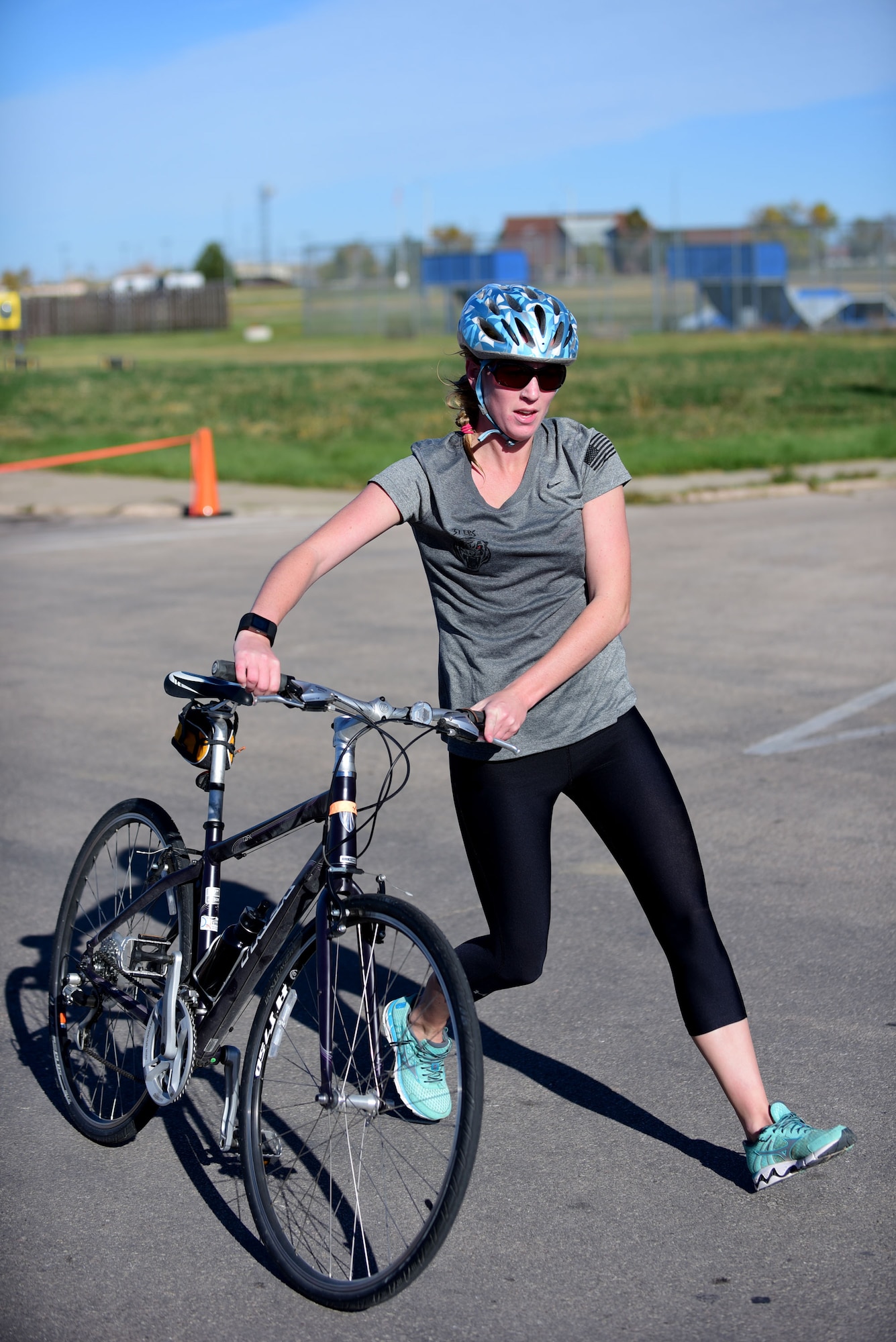 Molly Adams, 28th Force Support Squadron outdoor recreation center cashier, competes in the Fall Triathlon at the Bellamy Fitness Center at Ellsworth Air Force Base, S.D., Oct. 17, 2015. The competition consisted of a 750-meter swim, a 10K bike ride and a 5K run. (U.S. Air Force photo by Airman 1st Class James L. Miller/Released)