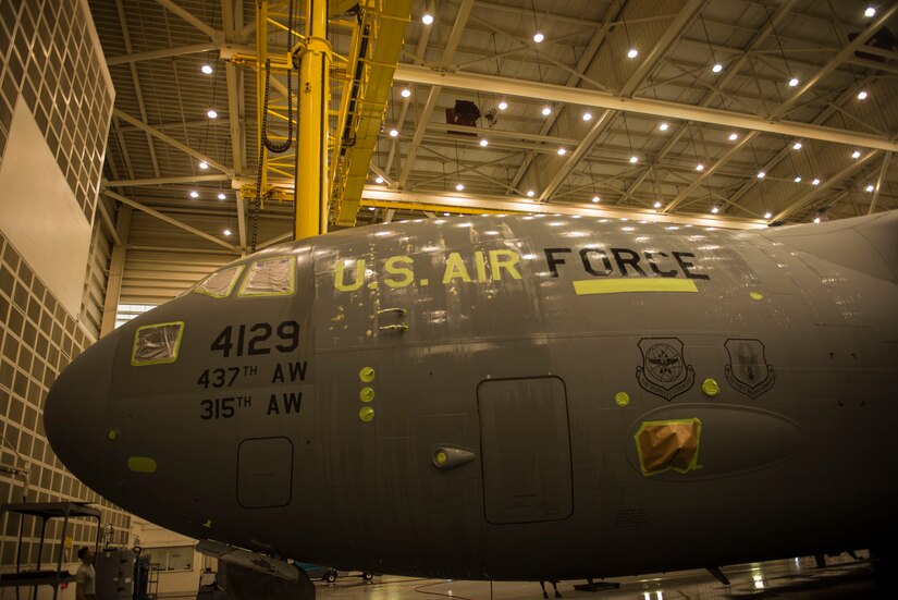 The C-17 Globemaster III in the photo is in the process of being sanded, washed and painted by members of the 437th Maintenance Squadron at Joint Base Charleston – Air Base, S.C., on Oct. 15, 2015. This facility is used for the sanding and painting maintenance for local JB Charleston aircraft. (U.S. Air Force photo/Airman 1st Class Thomas T. Charlton)