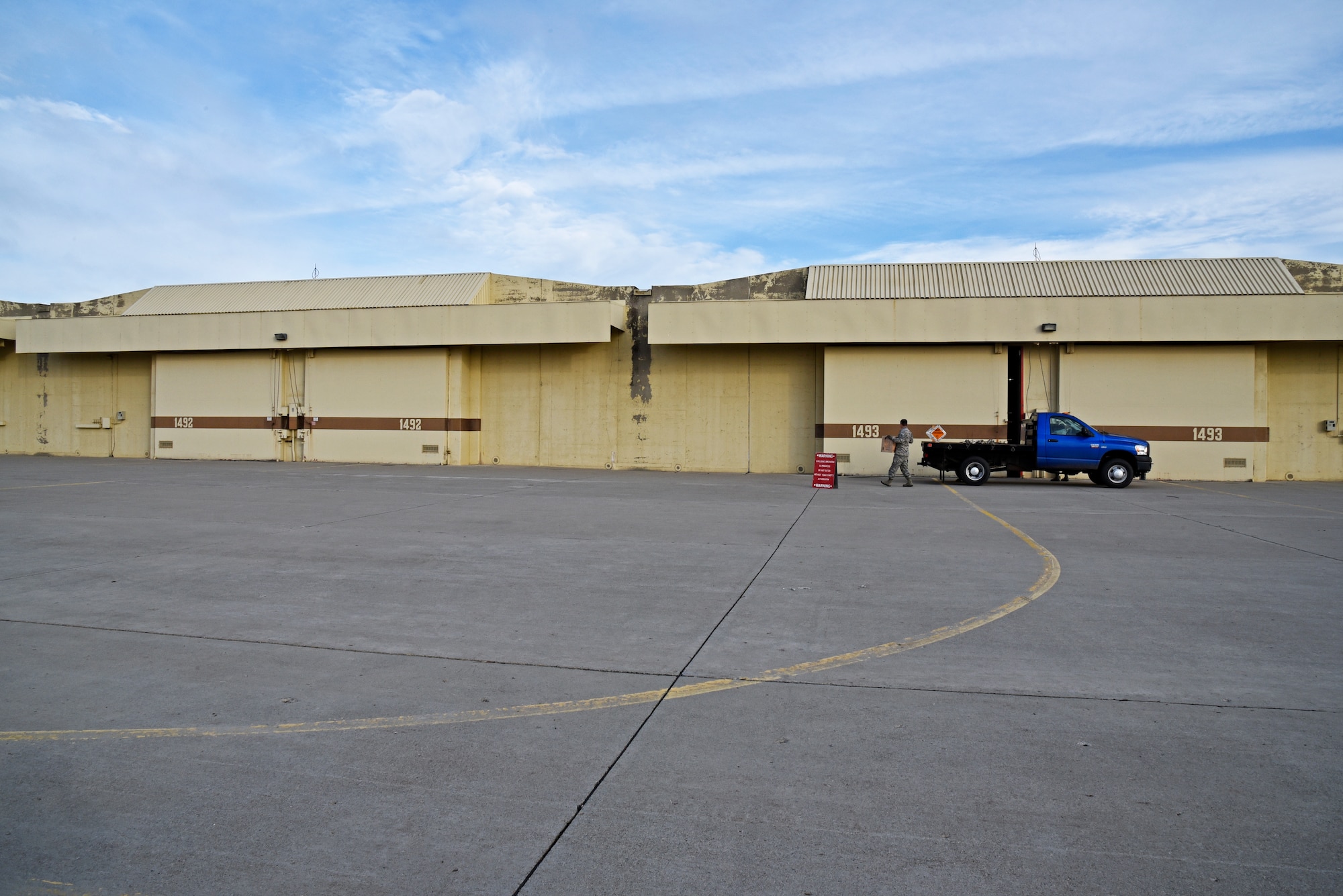 Airmen of the 92nd Maintenance Squadron munitions storage team move munitions into a superstructure storage site Oct. 28, 2015, at Fairchild Air Force Base, Wash. Munitions storage conducts munitions transportation and ensures superstructures are maintained. The munitions storage and inspection teams are in direct contact with line items and the stock pile value Fairchild has at any given time. (U.S. Air Force photo/Airman 1st Class Mackenzie Richardson)