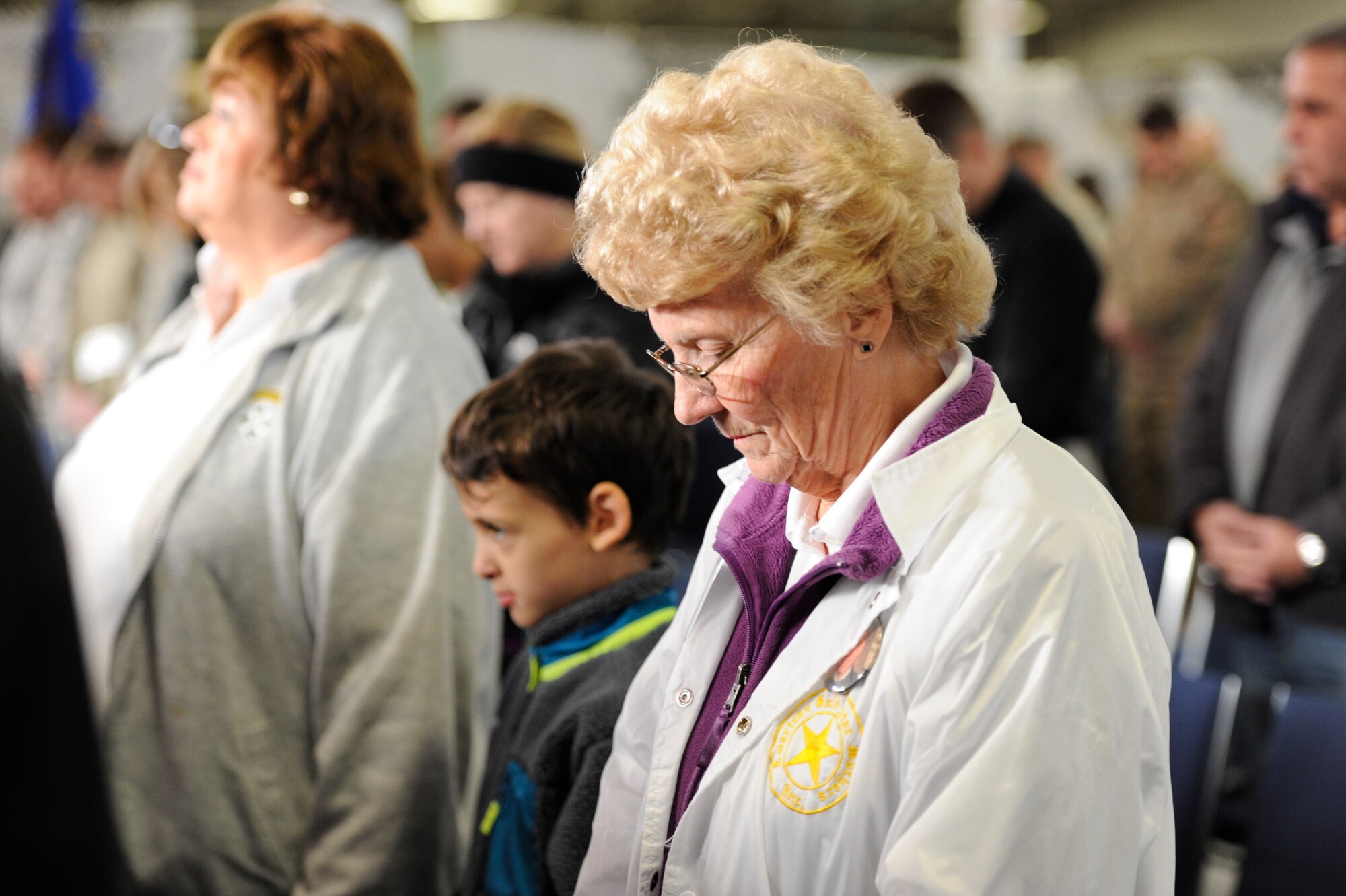 Gertude Corma, Gold Star Mother, prays during the opening ceremony of the ninth annual Gold Star Ruck March Oct. 24, 2015, at Joint Base McGuire-Dix-Lakehurst, N.J. The event is held for Gold Star Mothers, a charitable organization which supports family members who have lost a loved one in the line of military service. (U.S. Air Force photo by Senior Airman Sean M. Crowe/Released)