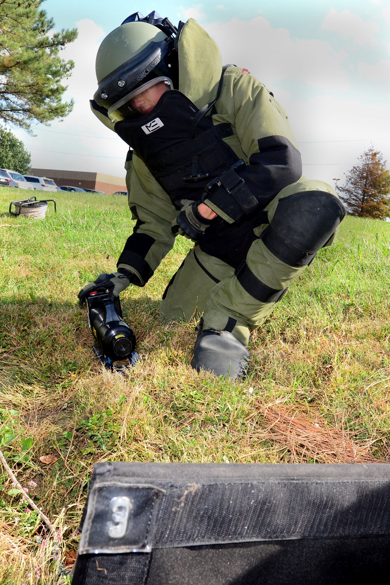 U.S. Air Force Tech. Sgt. Charles Shewmaker, 633rd Civil Engineer Squadron Explosive Ordnance Disposal team lead, uses an X-ray to scan simulated explosive ordnances at Langley Air Force Base, Va., Oct. 14, 2015. In addition to detecting and identifying possible explosive ordnances, EOD technicians can support the U.S. Secret Service in protection of the president, vice president and other dignitaries. (U.S. Air Force photo by Senior Airman Kimberly Nagle/Released) 
