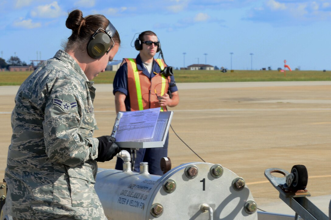 U.S. Air Force Airman 1st Class Brittany Litton, 633rd Logistics Readiness Squadron fuels distributor, prepares to fuel an F-22 Raptor at Langley Air Force Base, Va., Oct. 19, 2015. On average, the F-22 Raptor will take 2, 300 gallons of Jet-A fuel. (U.S. Air Force photo by Senior Airman Kimberly Nagle/Released)