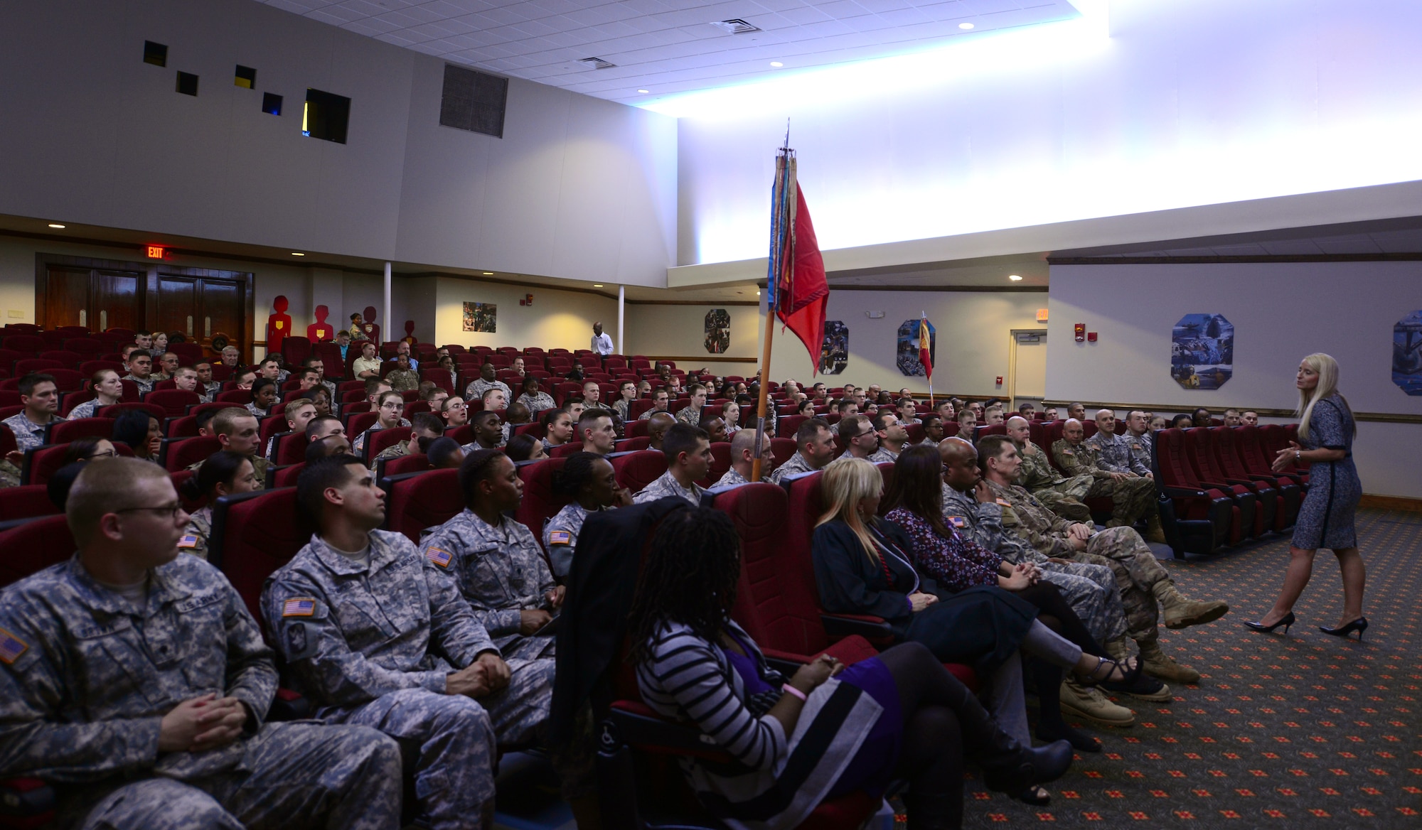 U.S. Army Soldiers and civilians assigned to the 597th Transportation Brigade listen to A. J. Brandt, Joint Base Langley-Eustis, Va., Family Advocacy Outreach Manager, speak about Domestic Violence Awareness Month at Fort Eustis, Va., Oct. 21, 2015. Family advocacy staff held numerous prevention education briefings and events surrounding the topic of domestic violence. (U.S. Air Force photo by Senior Airman Aubrey White/Released)