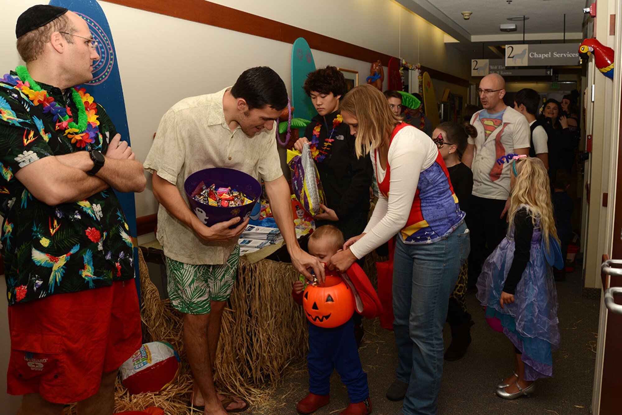 673d Air Base Wing Chapel Service workers dressed in an ‘Island’ theme and handed out candy at the hospital on Joint Base Elmendorf-Richardson, Alaska, Oct. 23, 2015. This annual event allowed kids to associate hospitals with more than just flu shots and medicine, but friendly fun as well. (U.S. Air Force photo/Airman 1st Class Christopher R. Morales)