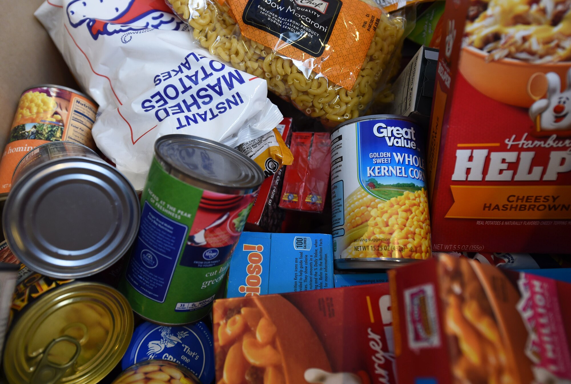 More than 600 food items were collected at various Starbucks donation sites throughout Denver to send to deployed men and women. Airman 1st Class Jacquelynne Kidd, 2nd Space Warning Squadron space operator, started the food drive as a way to help service members separated from loved ones feel more at home during the holiday season. (U.S. Air Force photo by Airman 1st Class Samantha Meadors/Released)