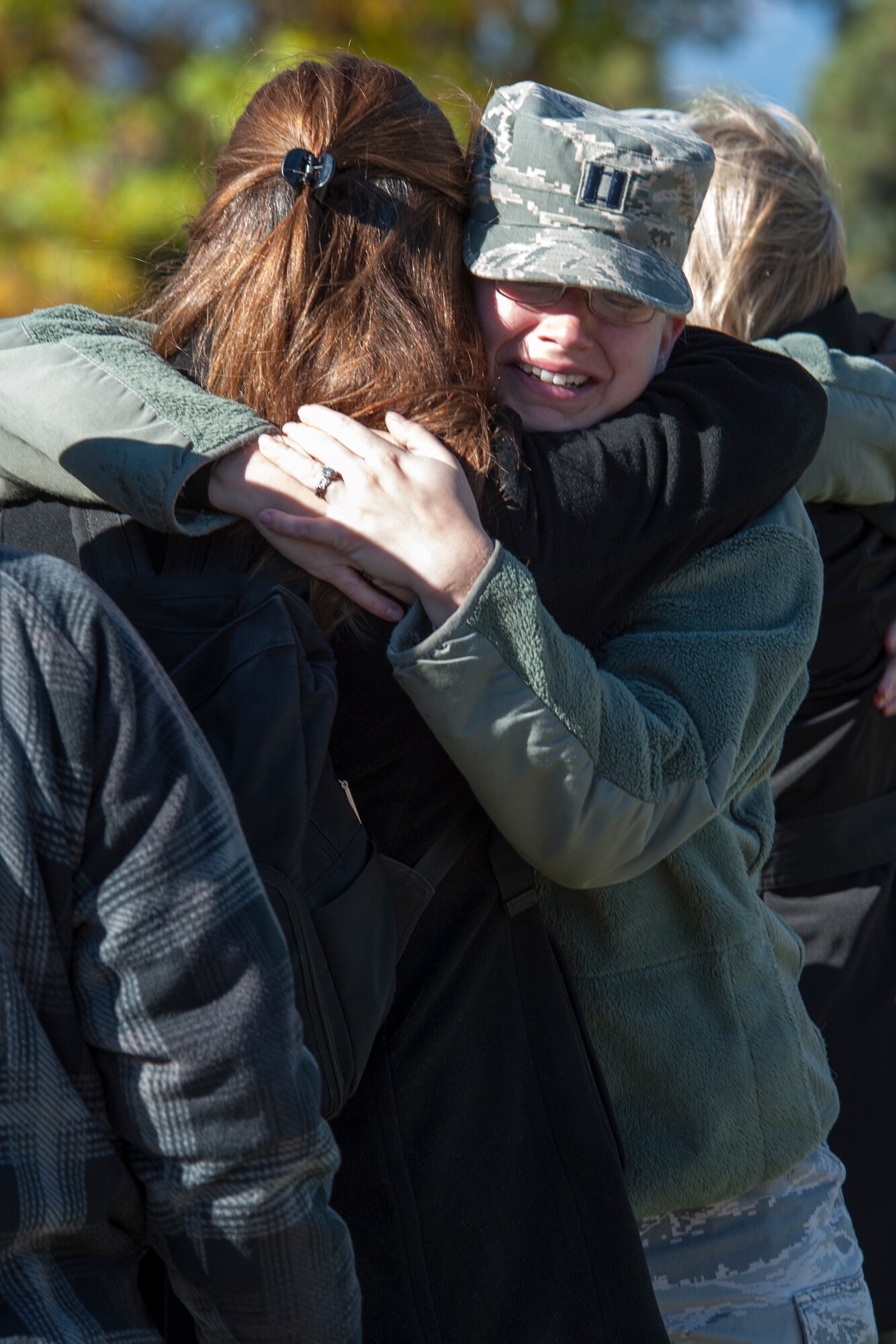 PETERSON AIR FORCE BASE, Colo. - Service members and family pay their respects to Maj. Phyllis Pelky during a dignified transfer ceremony at Peterson Air Force Base on Oct. 23, 2015. Pelky was deployed from the U.S. Air Force Academy and was killed in a helicopter accident Oct. 11, 2015 in Kabul, Afghanistan. (U.S. Air Force photo by Robb Lingley)