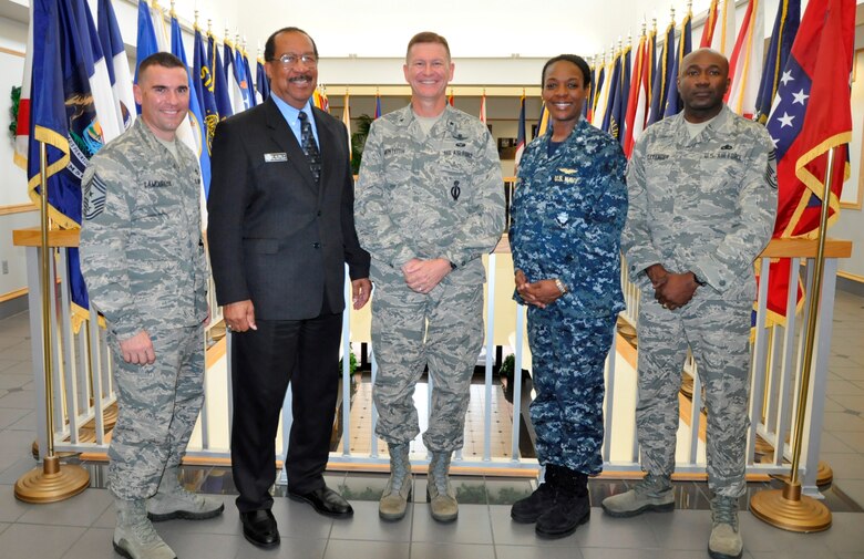 Brig. Gen. Wayne R. Monteith, 45th Space Wing commander, center, visits the Defense Equal Opportunity Management Institute for a mission brief and facility tour, Oct. 21, 2015. Joining him, after the mission, brief are Navy Commander Yolanda K. Mason, DEOMI Chief of Staff and acting commandant, second from right, Dr. Jose Bolton, Sr., DEOMI Dean, second from left, Chief Master Sgt. Boston Alexander, DEOMI Senior Enlisted Advisor, far right, and Chief Master Sgt. Jason A. Lamoureux, 45th Space Wing, command chief, far left. (U.S. Air Force photo/Christopher Calkins) 