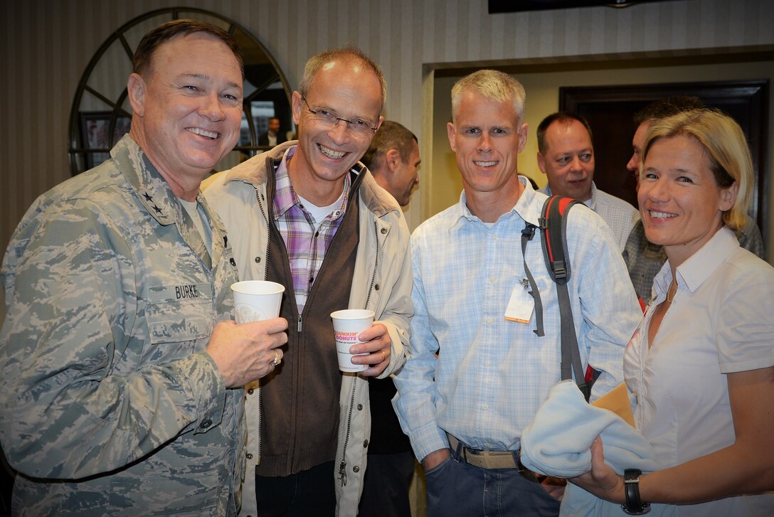 Air Force District of Washington Commander Maj. Gen. Darryl Burke meets with Colonel Bernhard Altersberger, German Air Attaché, Colonel Pelle Danielson, Swedish Air Attaché, and his spouse, Ms. Elizabeth Danielson before they depart Joint Base Andrews Oct. 25, 2015.  Air Attachés from several countries are currently touring Air Force installations across the United States to gain familiarity with the Air Force mission and to help build and sustain relationships between the U.S. and their respective countries.