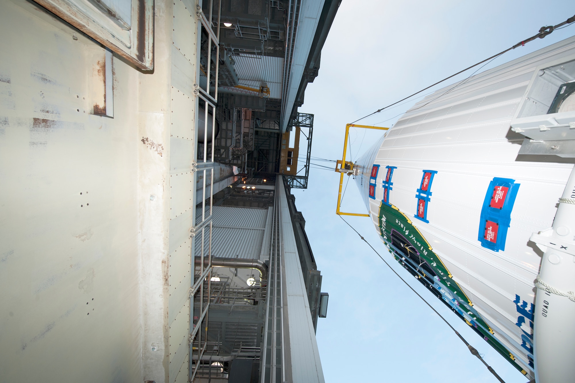 The encapsulated GPS IIF-11 satellite prepares to be lifted Oct. 21 for stacking atop a United Launch Alliance Atlas V 401 booster at the Vertical Integration Facility near Space Launch Complex 41, Cape Canaveral Air Force Station, Fla. GPS IIF satellites provide improved signals that will enhance the precise global positioning, navigation and timing services supporting both the warfighter and the growing civilian needs of our global economy. GPS IIF satellites provide improved navigational accuracy through advanced atomic clocks, a longer design life than previous GPS satellites, and a third operational civil signal (L5) that benefits commercial aviation and safety-of-life applications. The Air Force and its mission partners are scheduled to launch GPS IIF-11 from SLC-41 at CCAFS on Oct. 30. The launch window opens at 12:17 p.m. EDT and will remain open for 18 minutes. (Courtesy photo: United Launch Alliance)  