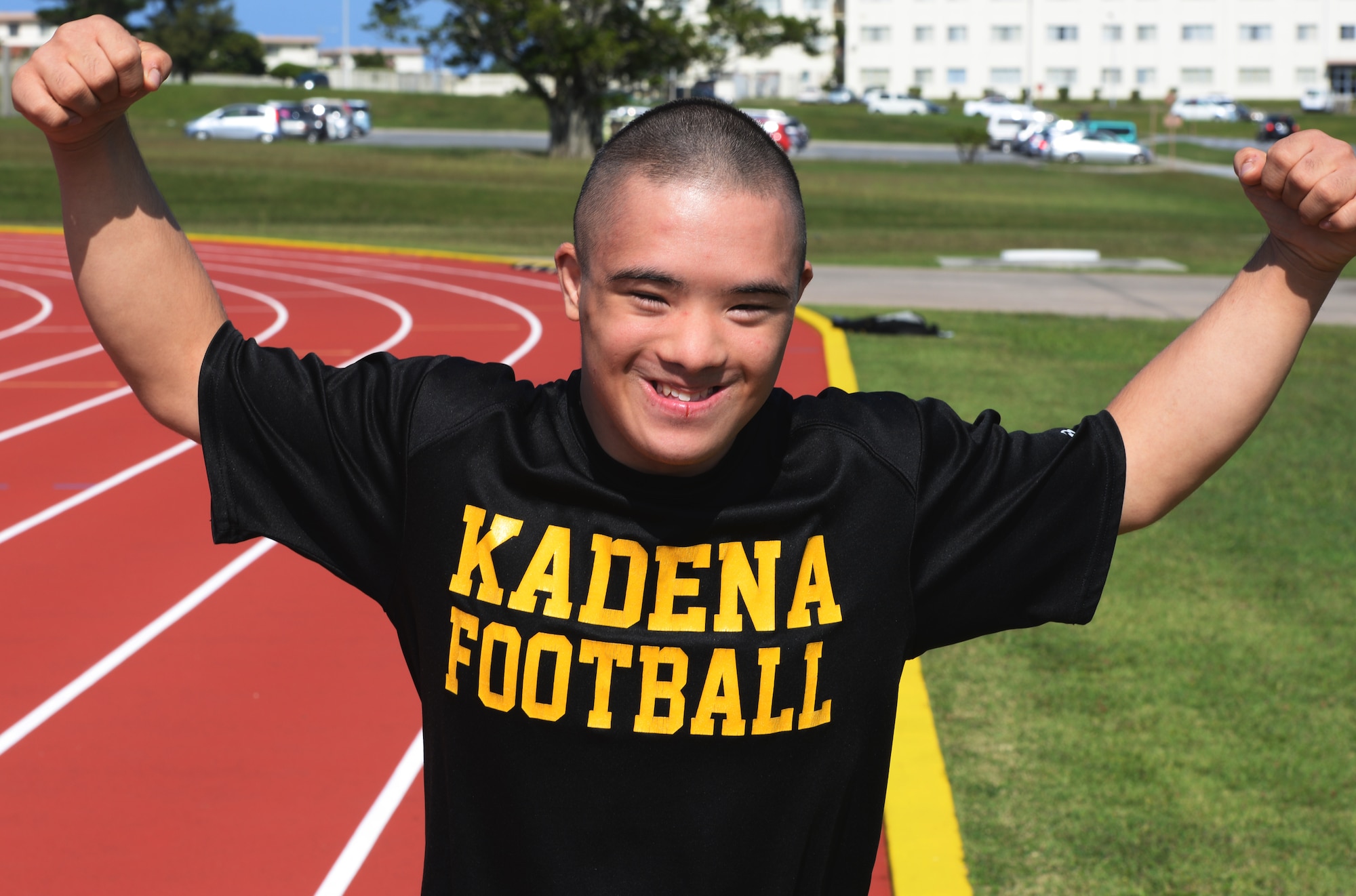 Ty Murdock, Kadena High School 12th grade student, is the honorary captain for his high school football team and competes annually at the Kadena Special Olympic games on Kadena Air Base. Murdock will go for gold again in the KSO after finishing in first place last year. He enjoys the applause and cheering from the crowd when he races in the competition. (U.S. Air Force photo by Senior Airman Omari Bernard)